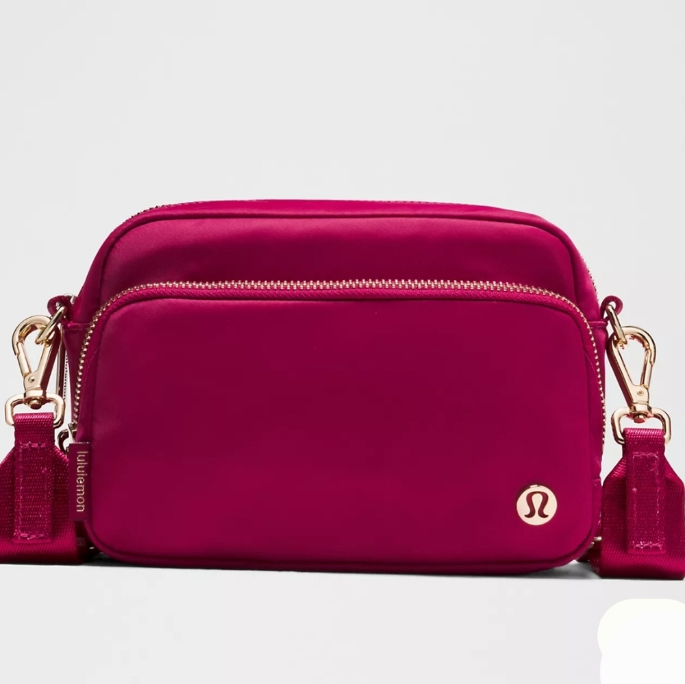 lululemon athletica Magenta Crossbody Bag with Gold Hardware